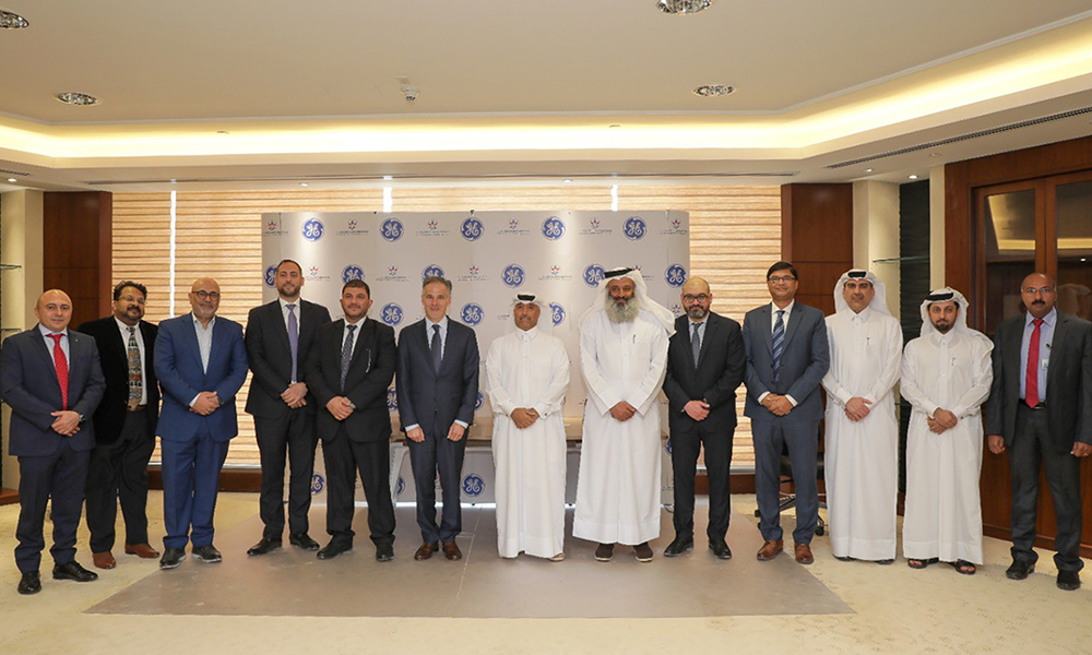 QEWC-GE-Signing1_1000x600.jpg