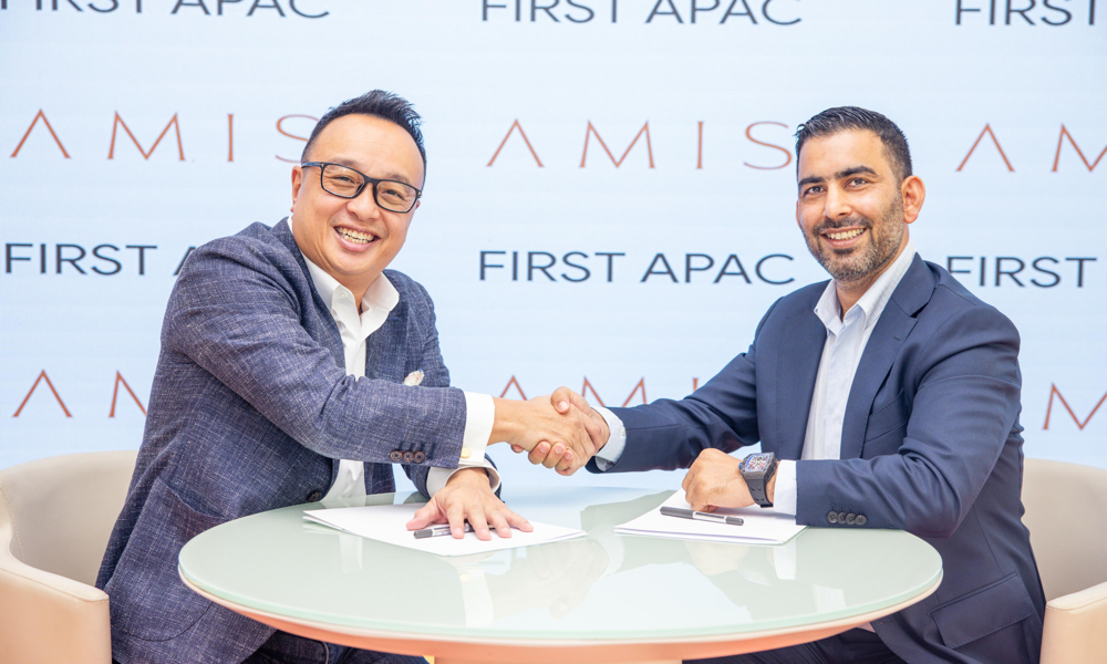 Left-to-right-Darrell-Lim-Founder-and-Shareholder-of-the-First-APAC-Fund-VCC-and-Neeraj-Mishra-Founder-and-CEO-of-AMIS-Development-during-the-MoU-signing.jpg